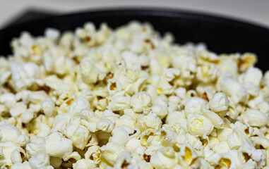 Making popcorn in a pan.
