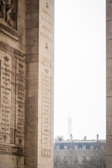 The Eiffel Tower seen under the arches of the Arc de Triomphe in Paris - 1