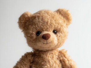 Obraz premium Classic Brown Plush Teddy Bear Portrait with Soft Fur Texture on Clean White Background for Commercial Product Photography