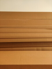 Stack of cardboard boxes forming a horizontal pattern