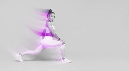 Workout Training. African American fitness lady stretching legs lunging forward, wearing yellow fitwear over blue studio background, embodying strength and wellness.