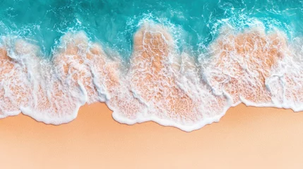 Fotobehang Aerial view of a beach showcasing a wave crashing onto the shore. © Diffin
