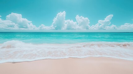 A serene beach scene featuring a clear blue sky and fluffy white clouds.