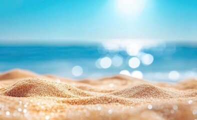 Obraz premium Abstract blur defocused background, featuring the lush, tropical summer beach illuminated by the sun’s rays. The golden sands are a striking contrast to the sea water, which colors at the junction of