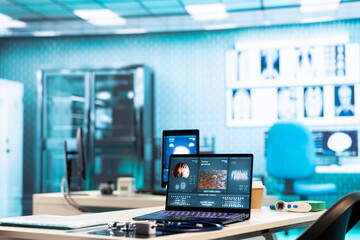 Empty medical office equipped with diagnostic tools and blood pressure monitor set for healthcare consultations and medical research to provide accurate diagnosis and patient care.