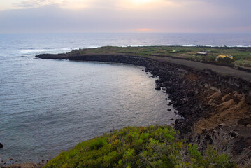 Fototapeta premium Dramatic Volcanic Cliffs and Tranquil Sea on Linosa Island, Pelagie Archipelago