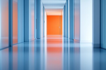 Long corridor with glass walls and bright orange accent in a modern building