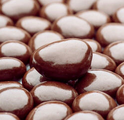 Shiny chocolate eggs forming a delicious background