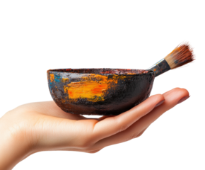 Preparation artist's hand holding bowl of paints and brush creative process isolated on transparent background