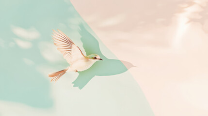 Obraz premium Spring bird in flight. Blurred spring landscape background with a light blue sky. Pastel colors.
