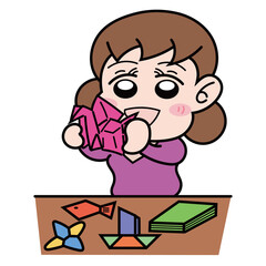 折り紙で遊んでいる女の子