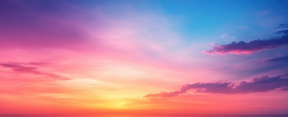 Obraz premium Serene Sunset Over Tranquil Ocean with Colorful Clouds and Gradient Sky Displaying Hues of Pink, Purple, Orange, and Blue at Dusk