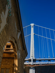 Fototapeta premium One of th two towers of the Ben Franklin Suspension Bridge that spans the Delaware River from Camden to Philadelphia. This tower is on the Philadelphia Side of the River