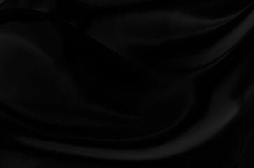 Fototapeta premium Black gray satin dark fabric texture luxurious shiny that is abstract silk cloth background with patterns soft waves blur beautiful.