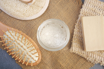 Spa elements including natural products and a wooden comb