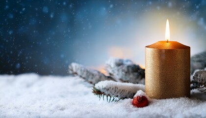 christmas candle in the snow with copy space