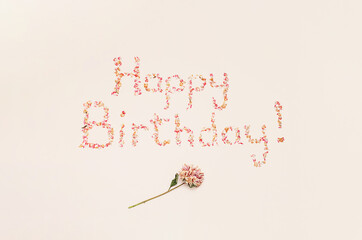 Happy Birthday Phrase Made from Dried Petals.