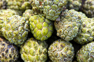 Ripe anon fruit displayed at the farmers market - Annona squamosa.