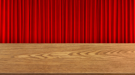 An empty wooden table is set against a red curtain background.