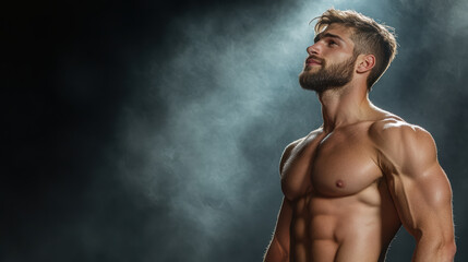 Fototapeta premium muscular man poses confidently under dramatic lighting, showcasing strength and determination