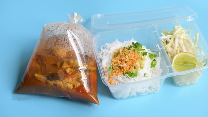 rice vermicelli with northern thai curry sauce in plastic bag