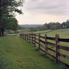 Obraz premium Wooden fences enclosing farm