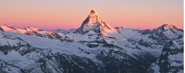 Snowy mountains at sunrise