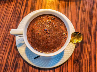 A cup of morning coffee on the table