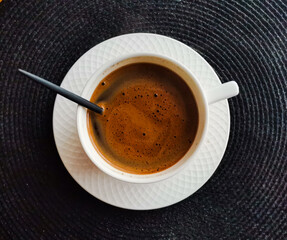 A cup of morning coffee on the table