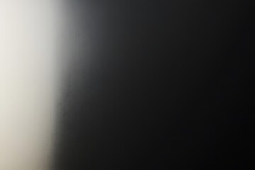 Abstract gradient background with light to dark transition.