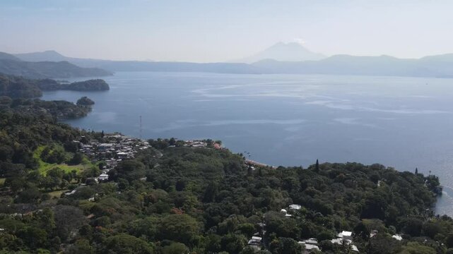 Views of the beautiful Ilopango Lake in El Salvador, with mountains and volcanoes around during the summer