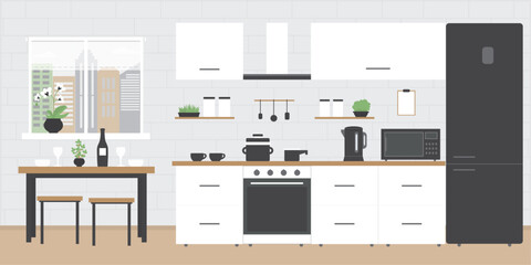 Fashionable kitchen interior with various furniture and electronic gadgets. Brick wall on background. Kitchen room, part of home