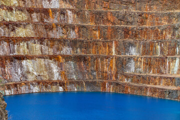 An abandoned uranium mine site now full of water.