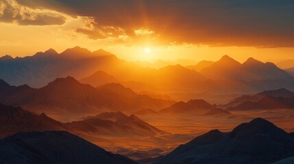 Beautiful golden sunset illuminates mountainous landscapes with warm light