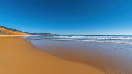 Sandy beach, gentle waves, coastal cliffs, clear sky, ocean view, travel, tourism