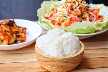 Papaya salad spicy and sticky rice Thai food