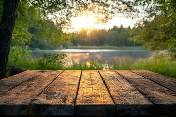 Rustic wooden tabletop overlooking a serene lake at sunrise, creating a tranquil nature scene ideal for product placement