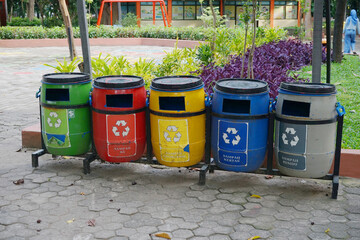 Closeup Colorful Recycling Bins in a Park