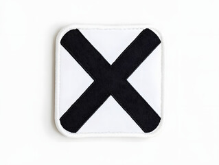 Obraz premium Minimalist Black and White Letter X Embroidered Patch Mockup