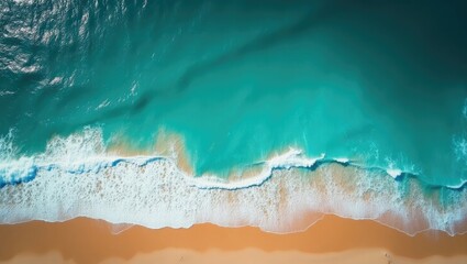 Stunning aerial view of summer waves and turquoise waters. A breathtaking overhead shot of the sea reveals striking tropical landscapes, with vibrant ocean waves meeting the colorful sands of a Med...