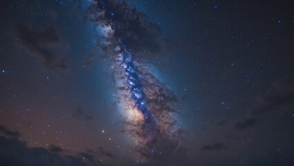 Fototapeta premium Expansive view of the Milky Way shining against a dark night sky. Deep celestial realm captured with long exposure and careful white balance adjustments, featuring noticeable noise and grain.