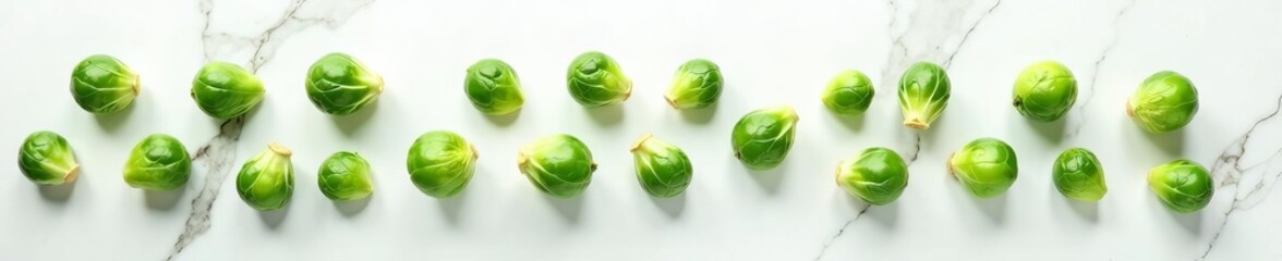 Naklejka premium Minimalist composition of brussels sprouts on white marble backdrop, kitchen, produce