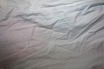 Gray Wrinkled Fabric with Natural Folds and Soft Texture Background