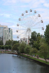 Ferris wheel in the park next to the house ,