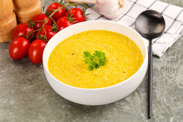 Vegetarian corn cream soup served parsley