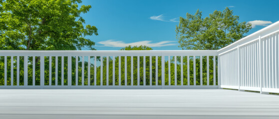 Fototapeta premium Bright sunny day on a white deck overlooking lush greenery