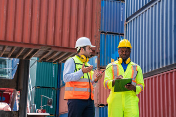 Portrait of team engineer working on solar panel and his blueprints