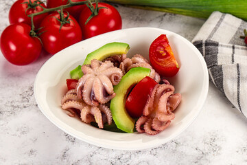 Salad with baby octopus and avocado