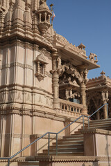 Swami Narayan, Hindu temple in Rajkot city, Gujarat, India. Indian landmark, beautiful architecture, architectural hindu monument, sight. Hinduism. Building facade. Exterior of Swami Narayan temple