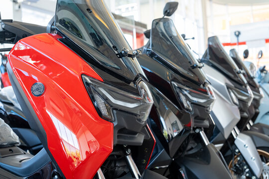 2025 Yamaha NMAX Turbo is displayed in a showroom, featuring a sporty design, sharp LED headlights, and an aerodynamic windshield, offering high performance on february 28,2025 in padang,indonesia